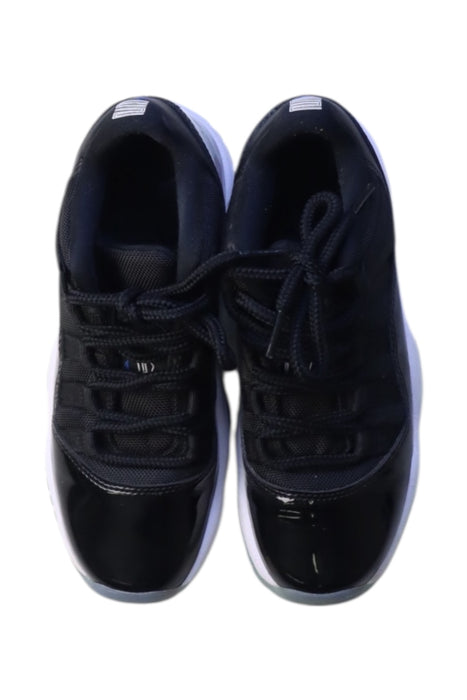 A Black Sneakers from Air Jordan in size 11Y for neutral. (Back View)