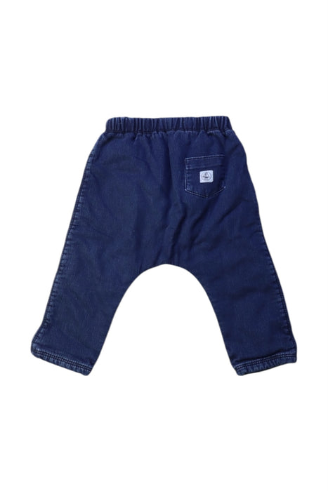 A Navy Jeans from Petit Bateau in size 6-12M for boy. (Back View)