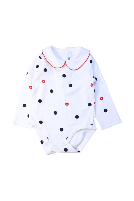 A White Long Sleeve Bodysuits from Jacadi in size 12-18M for girl. (Front View)