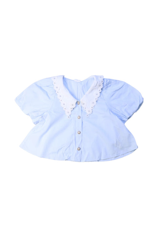 A Blue Short Sleeve Tops from little Mo & Co. in size 5T for girl. (Front View)