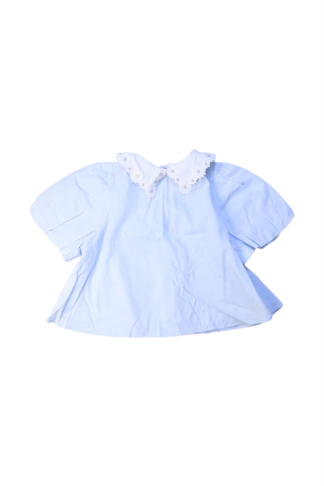 A Blue Short Sleeve Tops from little Mo & Co. in size 5T for girl. (Back View)