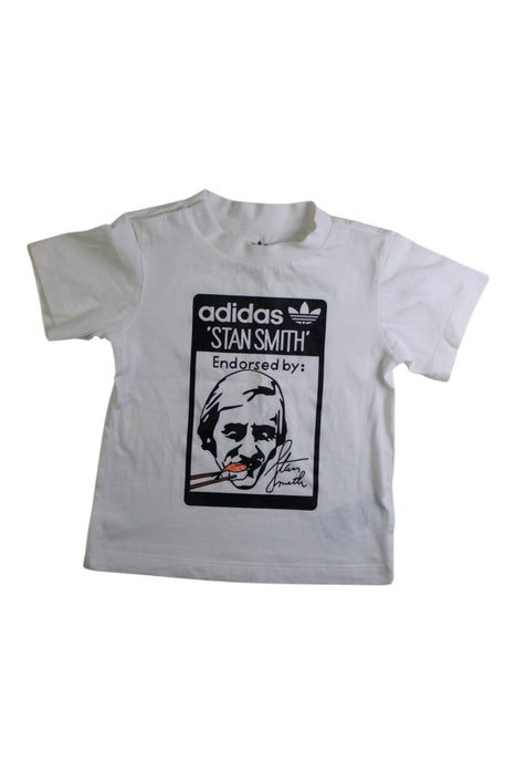 A White Short Sleeve T Shirts from Adidas in size 12-18M for boy. (Front View)