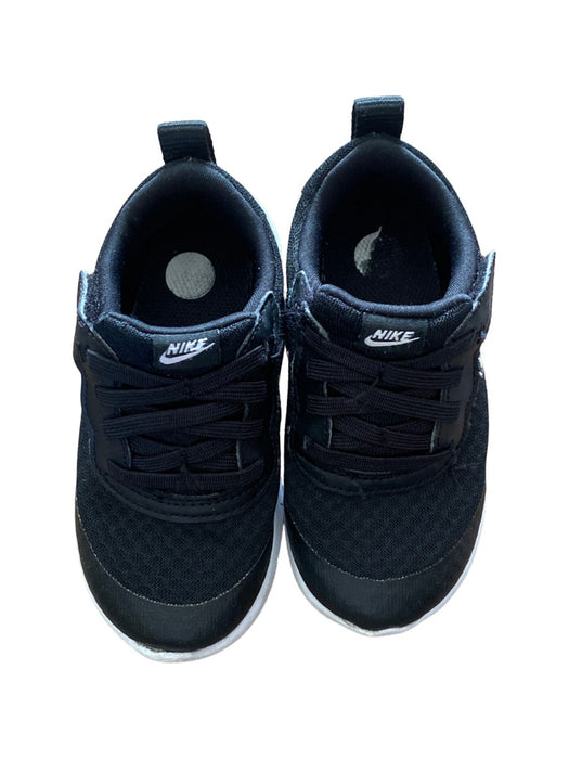 A Black Sneakers from Nike in size 3T for boy. (Back View)