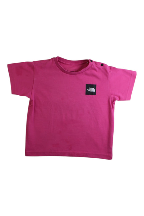 A Pink Short Sleeve T Shirts from The North Face in size 18-24M for girl. (Front View)