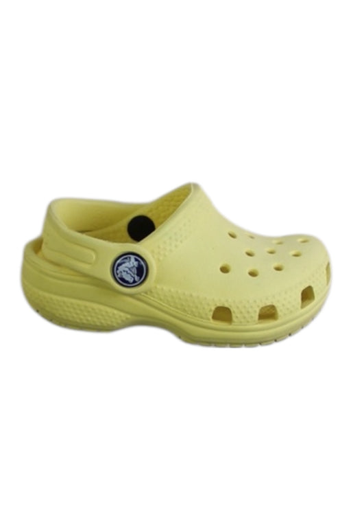 A Yellow Slip Ons from Crocs in size 12-18M for neutral. (Front View)
