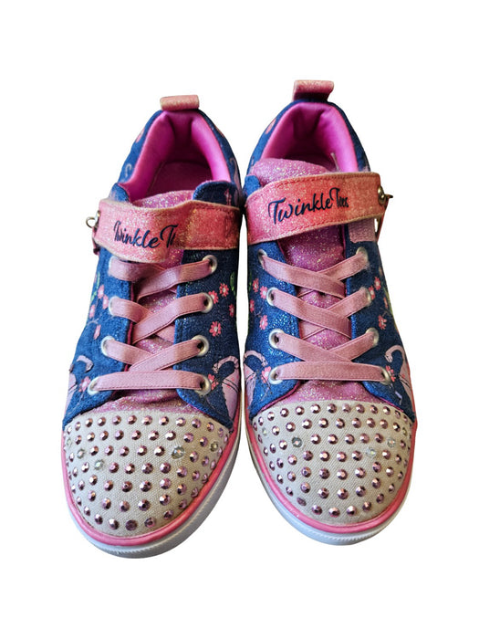 A Pink Sneakers from Skechers in size 10Y for girl. (Front View)