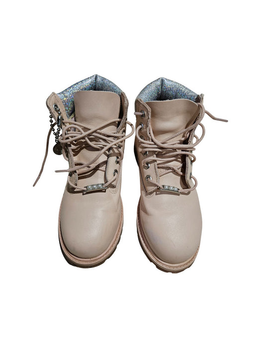 A Beige Casual Boots from Timberland in size 10Y for neutral. (Front View)