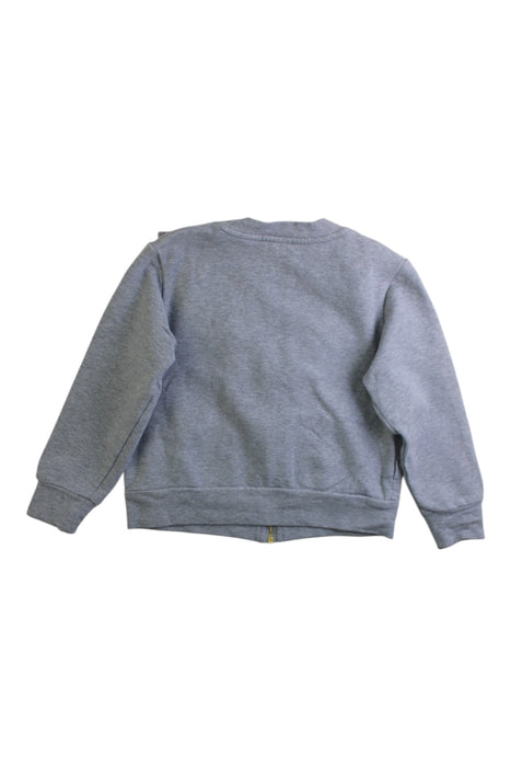 A Grey Zippered Sweatshirts from Jacadi in size 4T for girl. (Back View)