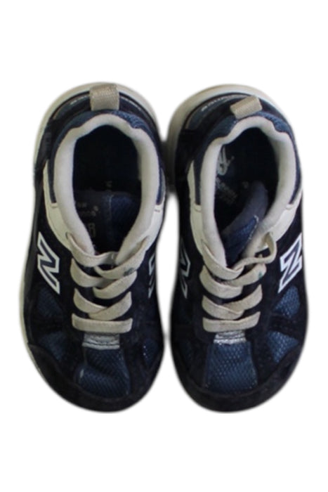 A Navy Sneakers from New Balance in size 18-24M for boy. (Back View)