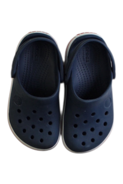 A Navy Slip Ons from Crocs in size 3T for neutral. (Back View)