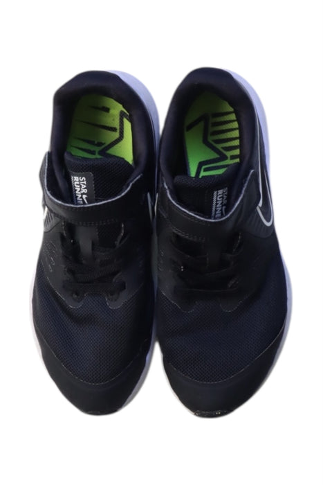 A Navy Sneakers from Nike in size 7Y for boy. (Back View)