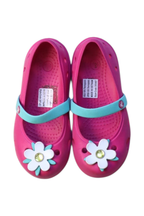 A Pink Slip Ons from Crocs in size 3T for girl. (Back View)