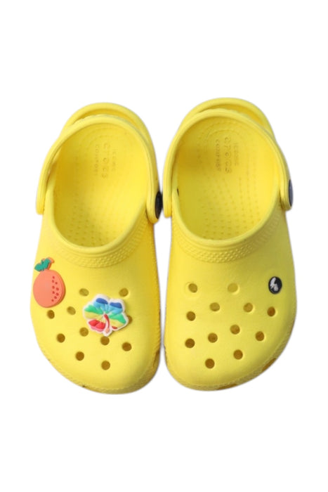 A Yellow Slip Ons from Crocs in size 3T for neutral. (Back View)