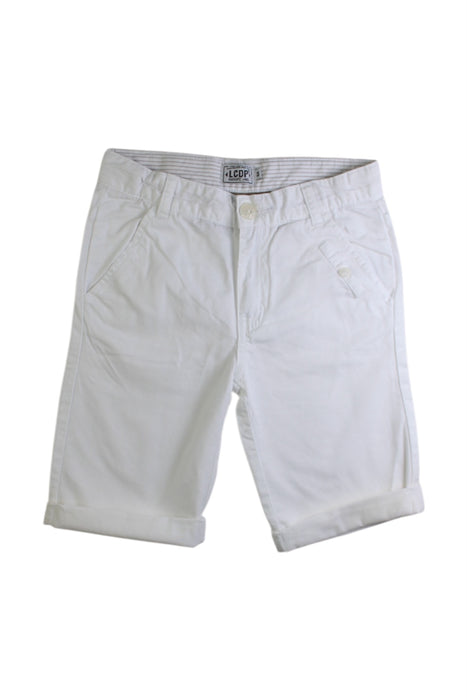 A White Shorts from La Compagnie des Petits in size 6T for boy. (Front View)