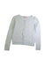 A White Cardigans from Bonpoint in size 8Y for girl. (Front View)
