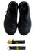 A Black Casual Boots from Dr. Martens in size 6T for boy. (Back View)
