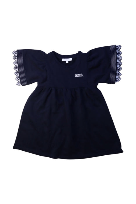 A Navy Short Sleeve Dresses from Chloe in size 3T for girl. (Front View)