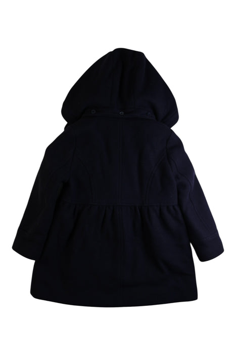 A Navy Coats from Jacadi in size 5T for girl. (Back View)