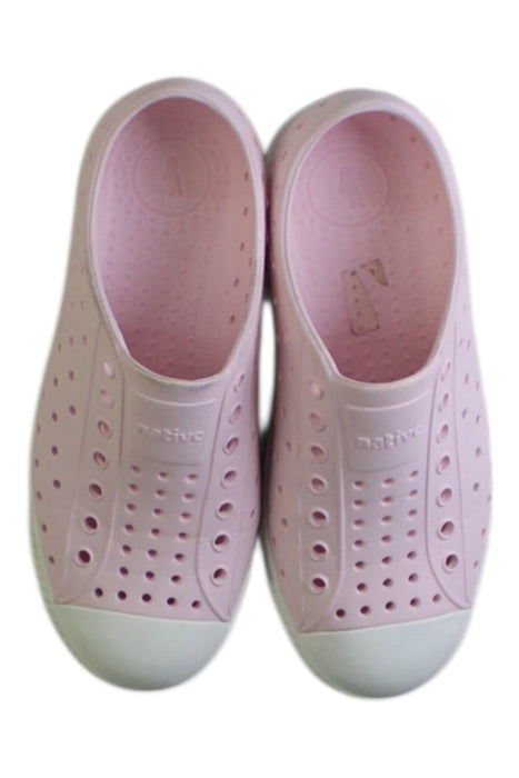 A Pink Slip Ons from Native Shoes in size 7Y for girl. (Back View)