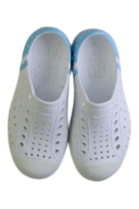 A White Slip Ons from Native Shoes in size 5T for boy. (Back View)
