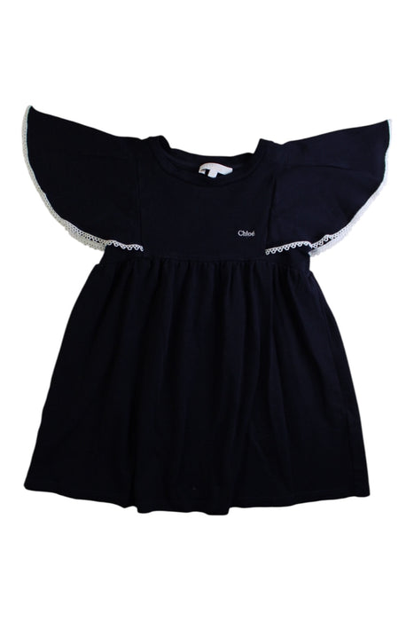A Black Long Sleeve Dresses from Chloe in size 4T for girl. (Front View)