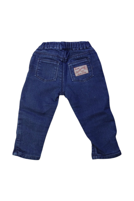 A Blue Jeans from Petit Bateau in size 6-12M for boy. (Back View)