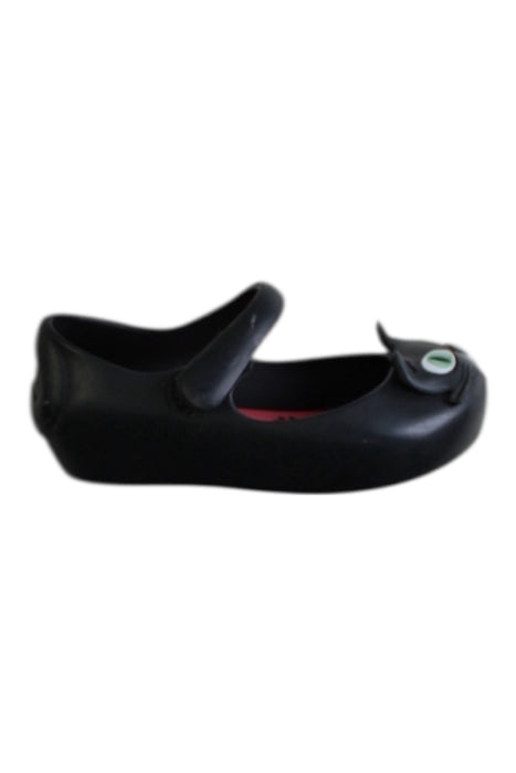 A Black Flats from Mini Melissa in size 4T for girl. (Front View)