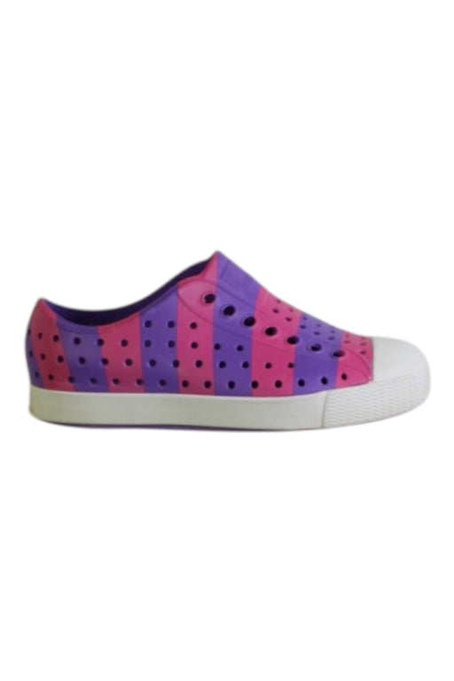 A Pink Slip Ons from Native Shoes in size 4T for girl. (Front View)