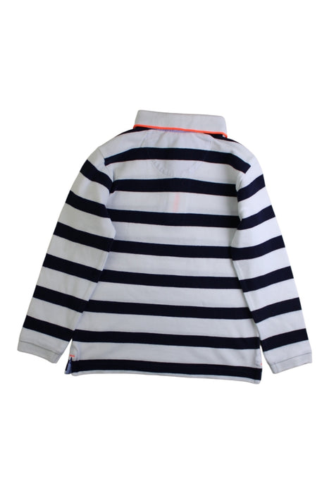 A Navy Long Sleeve Shirts from Jacadi in size 4T for boy. (Back View)