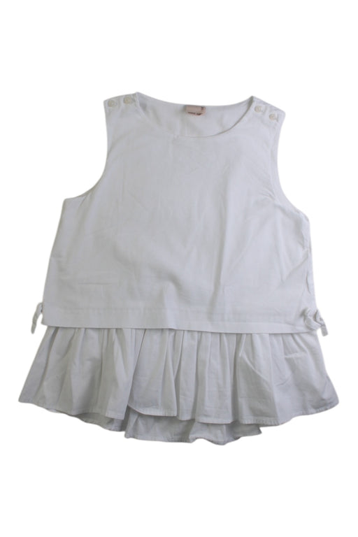 A White Sleeveless Tops from Petit Main in size 4T for girl. (Front View)