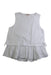 A White Sleeveless Tops from Petit Main in size 4T for girl. (Front View)