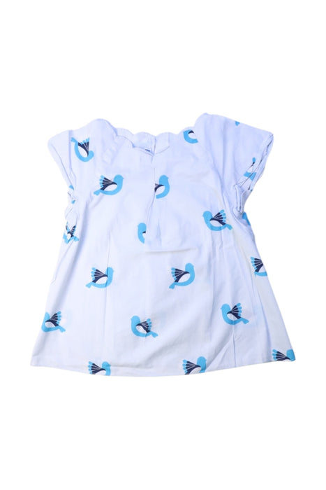 A White Short Sleeve Tops from Jacadi in size 6T for girl. (Front View)