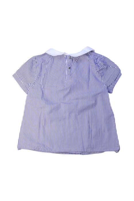 A Blue Short Sleeve Shirts from Jacadi in size 6T for girl. (Back View)