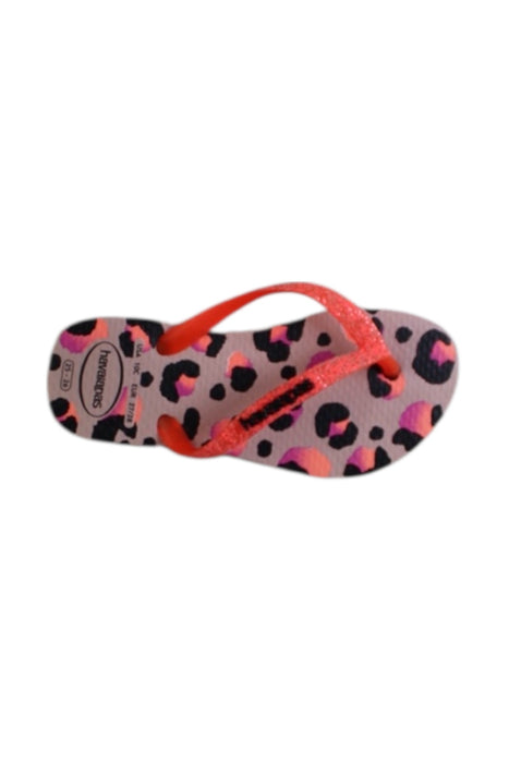 A Pink Flip Flops from Havaianas in size 4T for girl. (Front View)