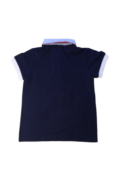 A Navy Short Sleeve Polos from Jacadi in size 4T for boy. (Back View)
