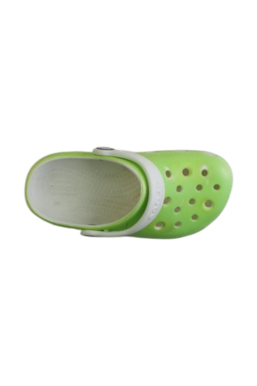 A Green Slip Ons from Crocs in size 5T for neutral. (Front View)