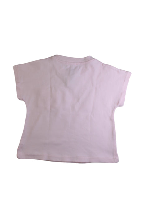 A Pink Short Sleeve T Shirts from Jacadi in size 6T for girl. (Back View)