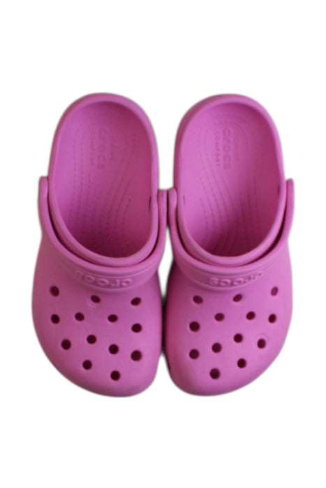 A Pink Slip Ons from Crocs in size 5T for girl. (Back View)