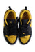 A Black Sneakers from Air Jordan in size 7Y for boy. (Back View)