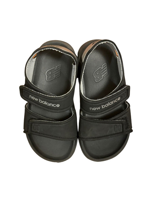 A Black Sandals from New Balance in size 3T for neutral. (Front View)