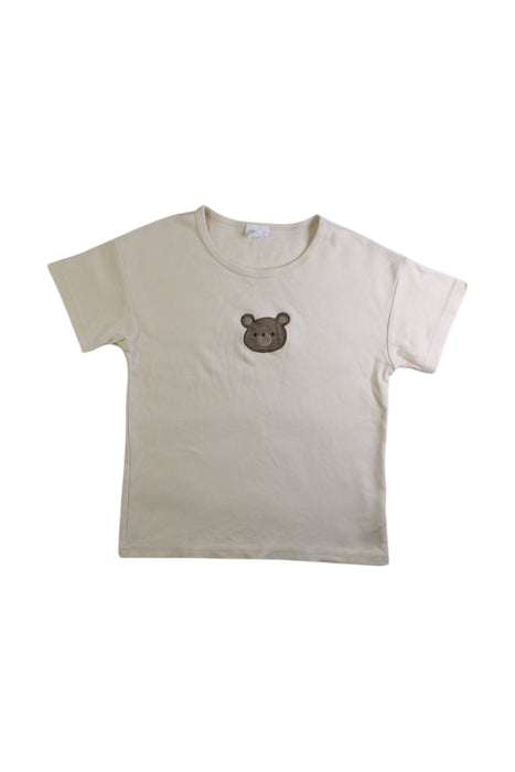 A Ivory Short Sleeve T Shirts from Jamie Kay in size 5T for girl. (Front View)