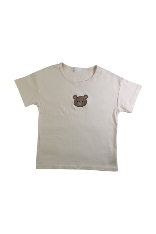 A Ivory Short Sleeve T Shirts from Jamie Kay in size 5T for girl. (Front View)