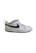 A White Sneakers from Nike in size 5T for boy. (Front View)