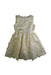 A Ivory Sleeveless Dresses from Us Angels in size 5T for girl. (Front View)