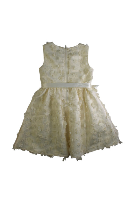 A Ivory Sleeveless Dresses from Us Angels in size 5T for girl. (Back View)