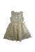A Ivory Sleeveless Dresses from Us Angels in size 5T for girl. (Back View)
