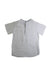 A White Short Sleeve Tops from Jacadi in size 6T for boy. (Front View)