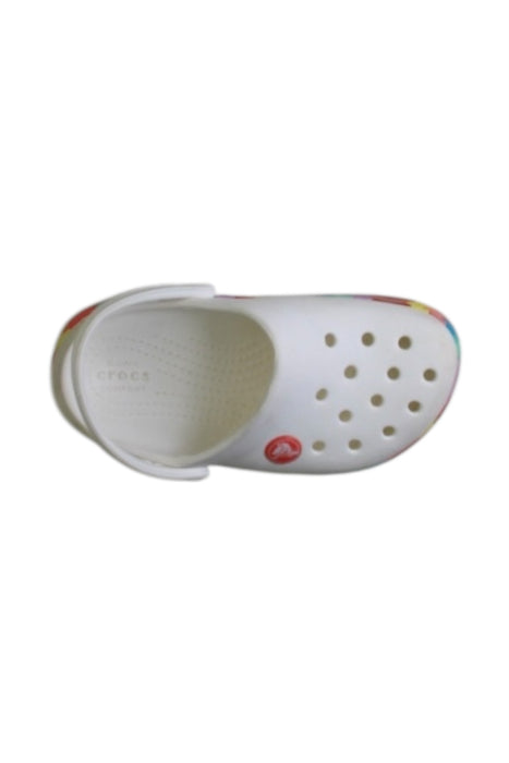 A White Slip Ons from Crocs in size 4T for girl. (Front View)