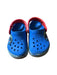 A Blue Slip Ons from Crocs in size 4T for boy. (Front View)