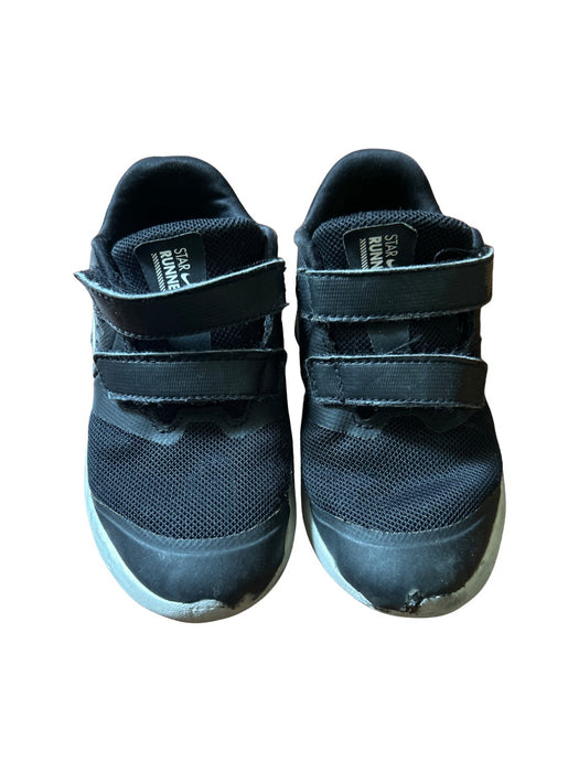 A Black Sneakers from Nike in size 4T for neutral. (Front View)